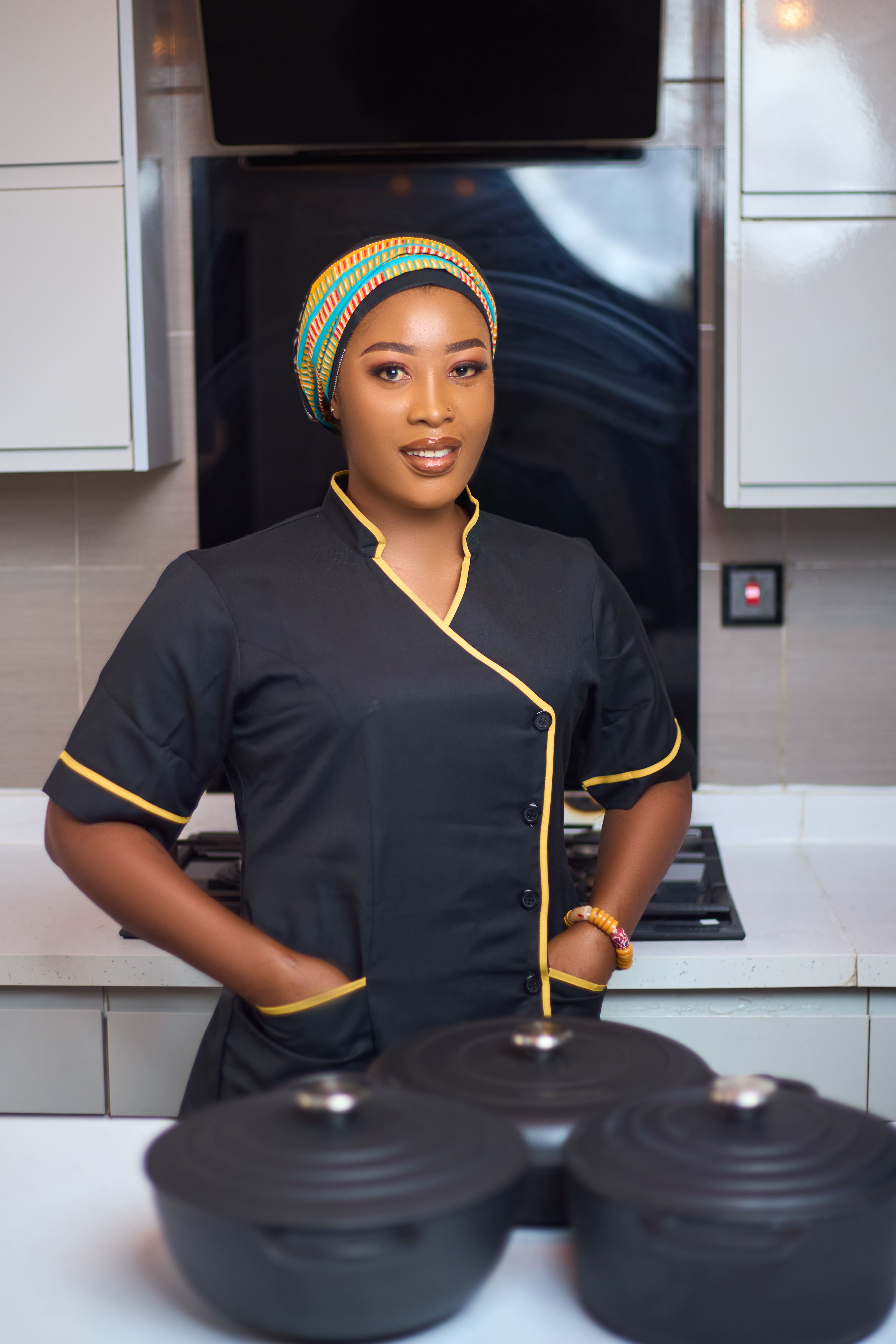 Live cooking session — pots on fire, sizzling Ghanaian cuisine